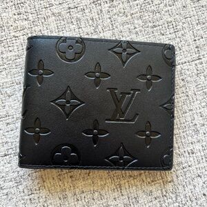 L V Men’s Black Monogram Embossed Leather Wallet